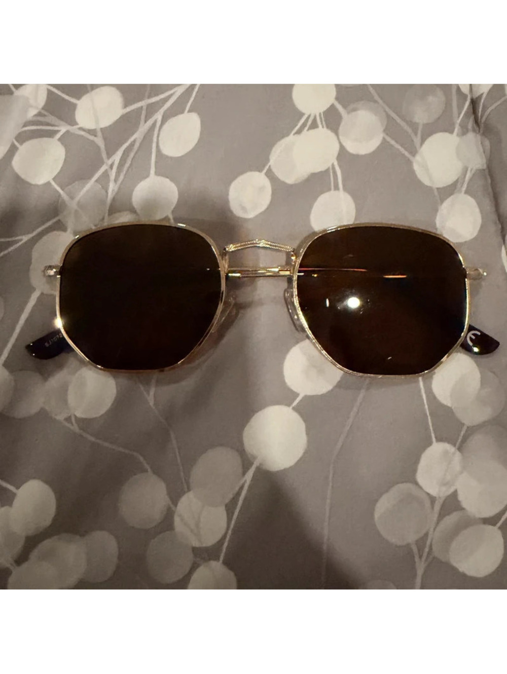Gold metal sunglasses with brown lenses